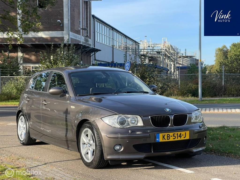 BMW 1-serie 116i High Executive |Leer|Xenon|Schuifdak|LM Vel, Achterwielaandrijving, Gebruikt, 4 cilinders, Bruin
