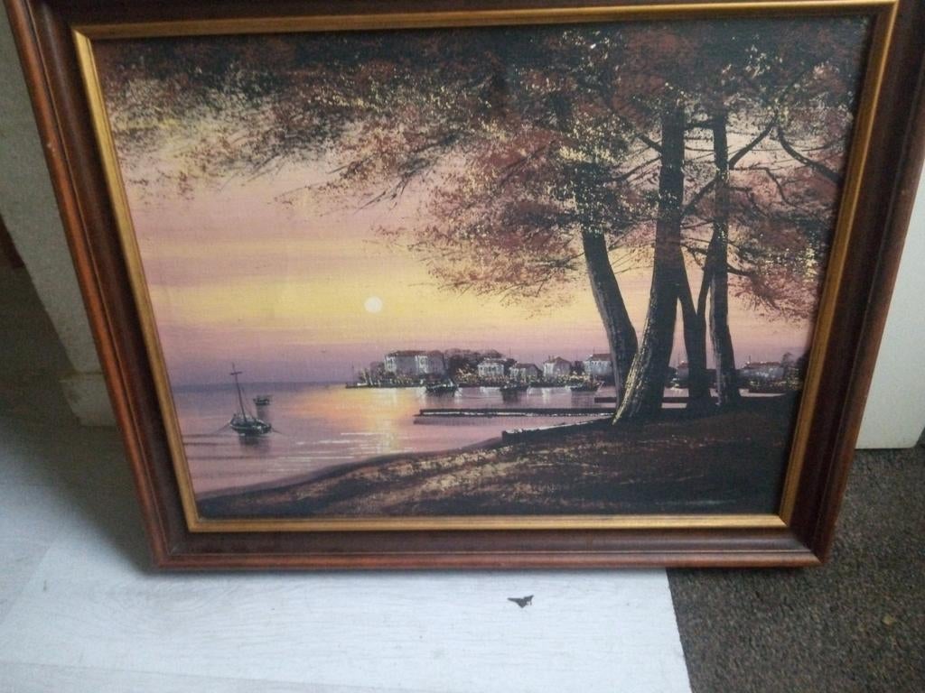 Schilderij zonsondergang met boot en dorp. 62 bij 52 cm, Ophalen of Verzenden