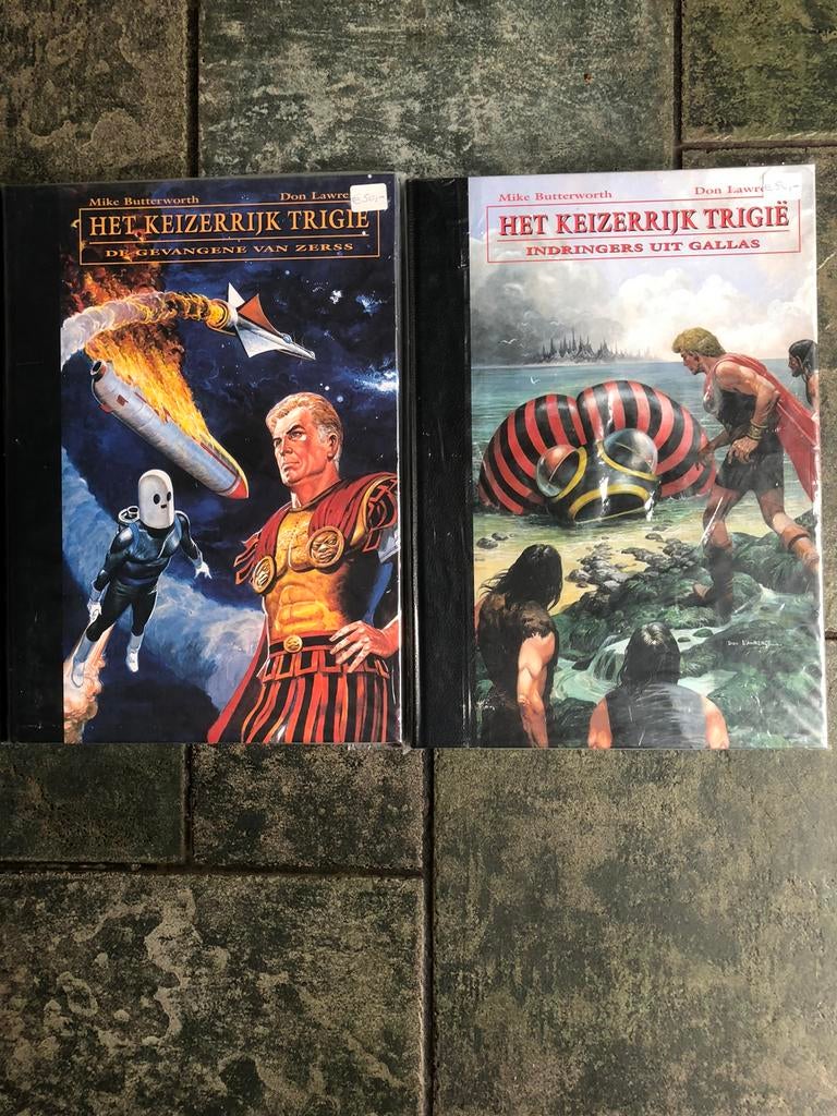 2 grootformaat HC  intergrale Trigie stripboeken ., Meerdere stripboeken, Ophalen of Verzenden, Zo goed als nieuw