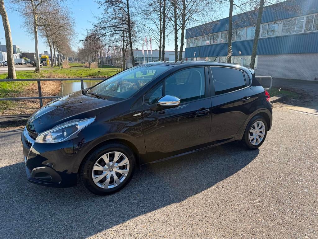 Peugeot 208 1.2 PureTech Urban Soul!2016!Airco!PDC!Navi!Trek, Auto's, Peugeot, Voorwielaandrijving, Gebruikt, 1199 cc, 23 km/l