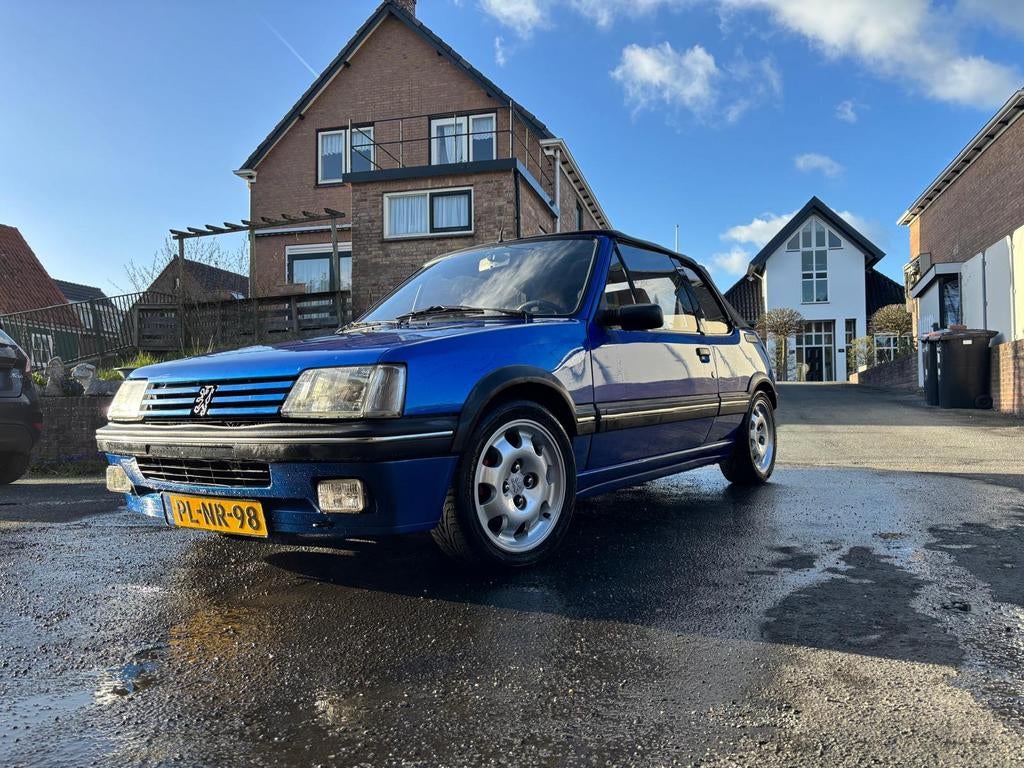 Peugeot 205 1.6 CTI Cabriolet S6 1986 Blauw, Auto's, Peugeot, Voorwielaandrijving, Zwart, Cabriolet, Blauw