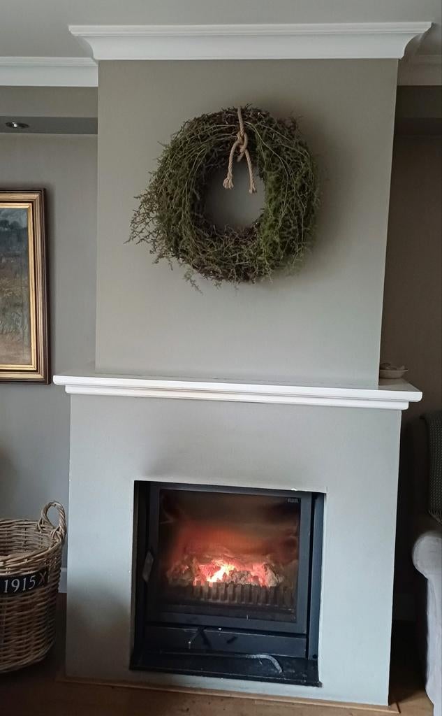 Flam houtkachel met automatische deur, Ophalen