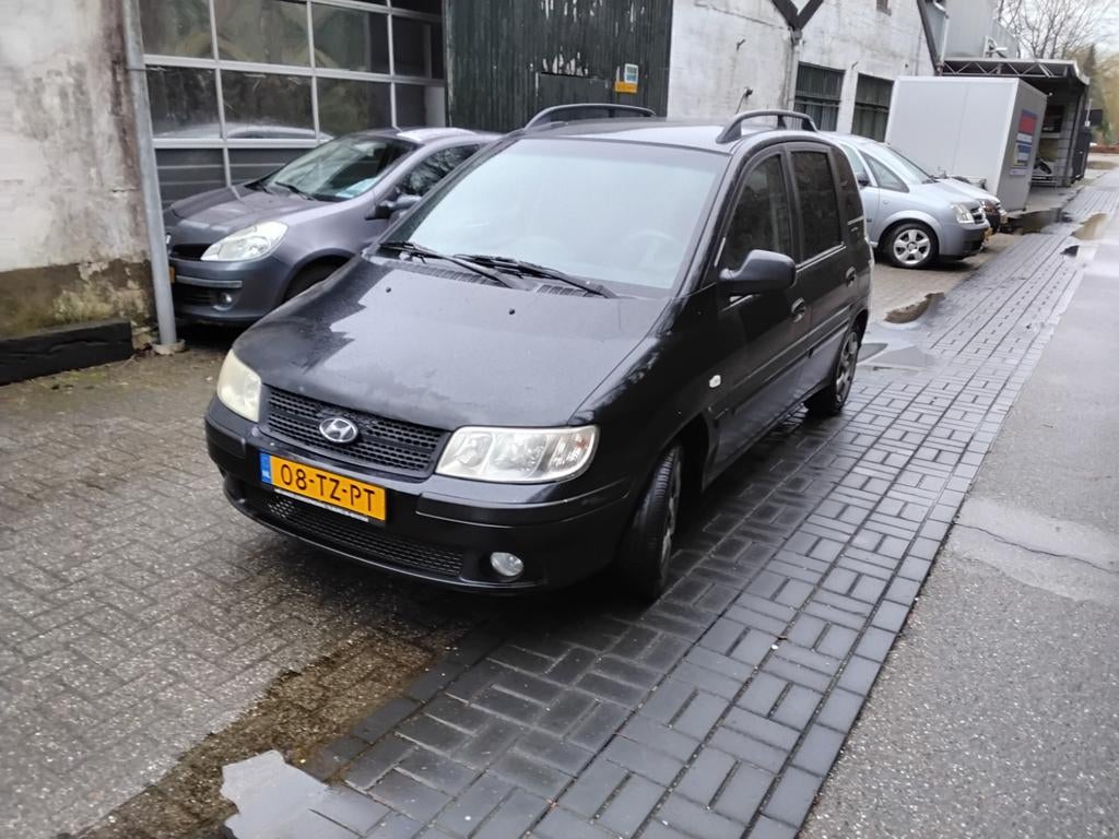 Hyundai Matrix 1.6 2007 Zwart, Auto's, Voorwielaandrijving, Matrix, Stof, 4 cilinders