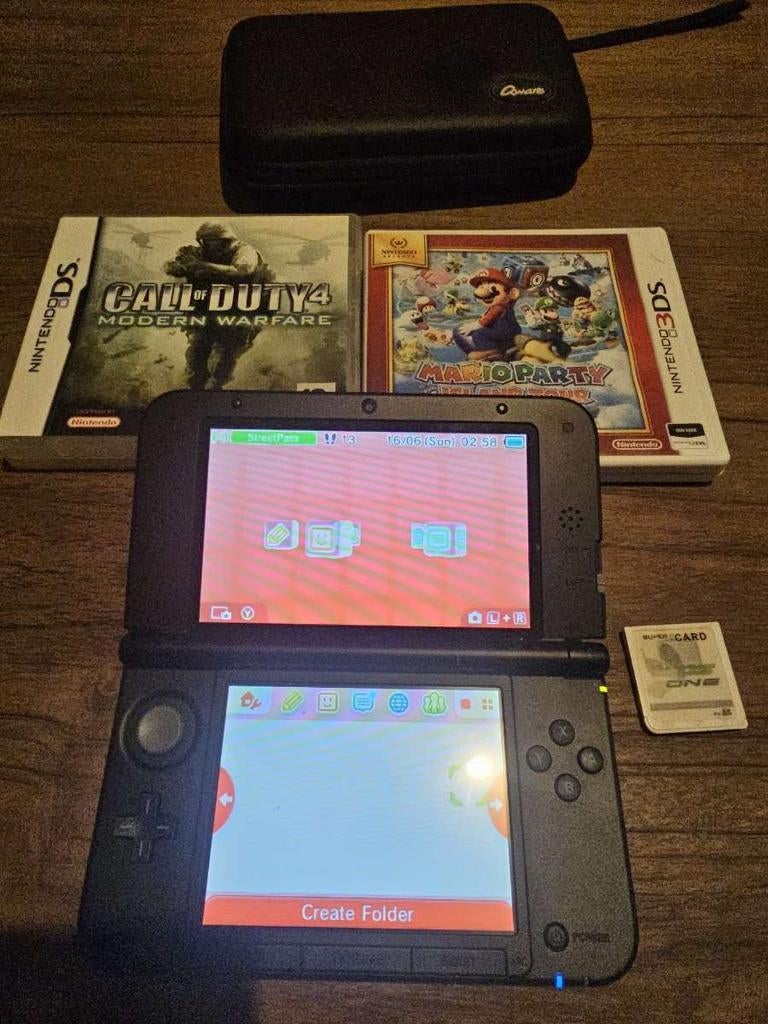 Nintendo 3DS XL Rood met  R4 kaart en 2games, Met games, 3DS XL, Ophalen of Verzenden, Zo goed als nieuw