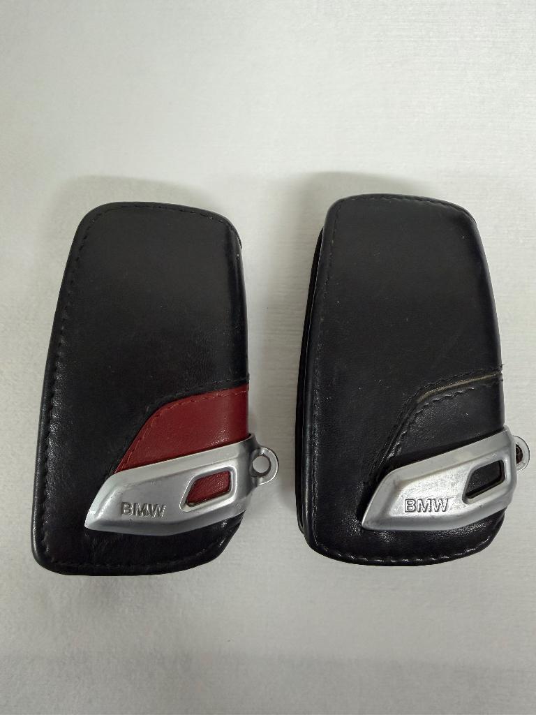 2x Lederen sleutel etui voor een BMW, Ophalen of Verzenden, Gebruikt