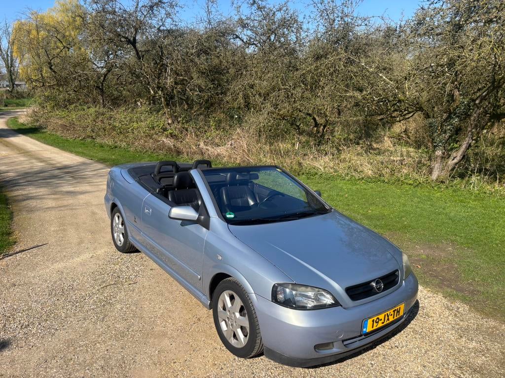 Opel Astra 1.8 16V Cabrio 2002 Grijs, Auto's, 125 pk, 1280 kg, Zwart, 4 cilinders