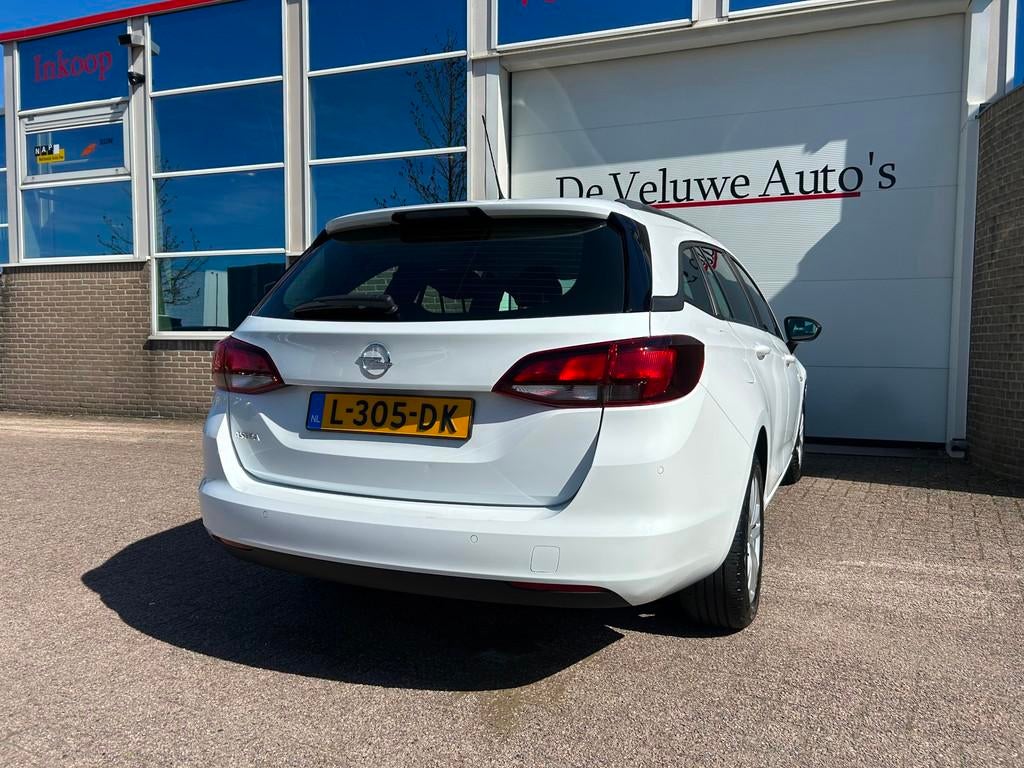 Opel Astra Sports Tourer 1.2 Edition 131PK|Cruise|Carplay|1e, Stof, 1199 cc, Wit, Origineel Nederlands