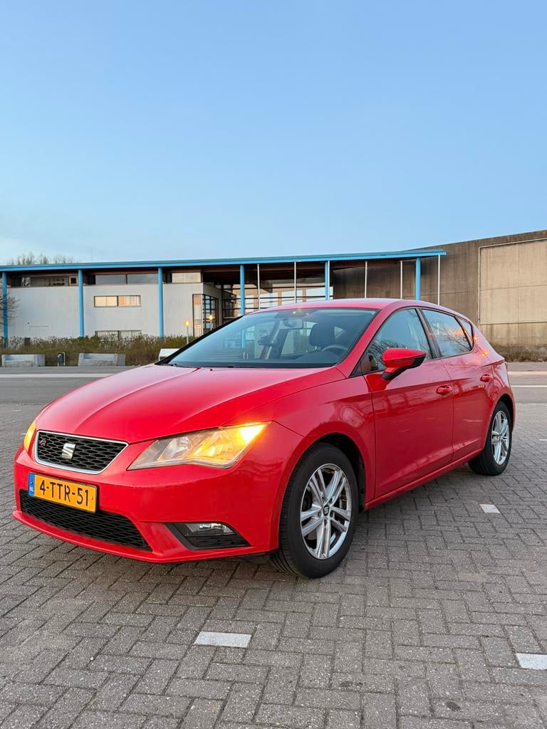 Seat Leon 1.2 TSI 63KW/85PK 2014 Rood, Auto's, Voorwielaandrijving, Euro 5, Stof, Zwart
