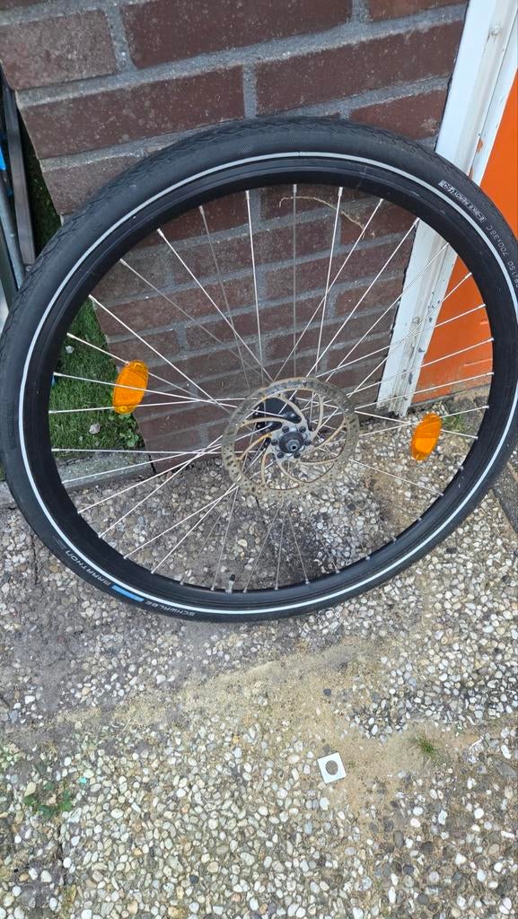 Fietsband 28 inch voorwiel, Ophalen