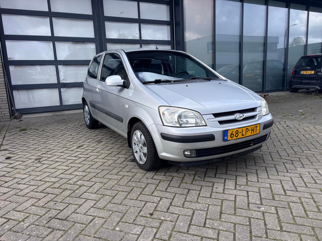 Hyundai Getz 1.3 3DRS AUTOMAAT 2003 Grijs, Auto's, 450 kg, 40 €/maand, 4 cilinders, 1006 kg