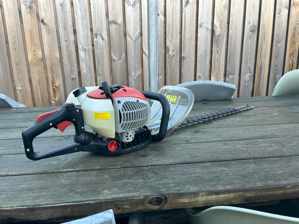 Ikra heggenschaar NU 130 euro, Tuin en Terras, Heggenscharen, Ophalen, Zo goed als nieuw, Benzine