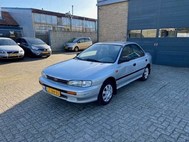 Subaru Impreza 1.6 GL Sedan-Automaat + Airco, Gebruikt, Zwart, 4 cilinders, Origineel Nederlands