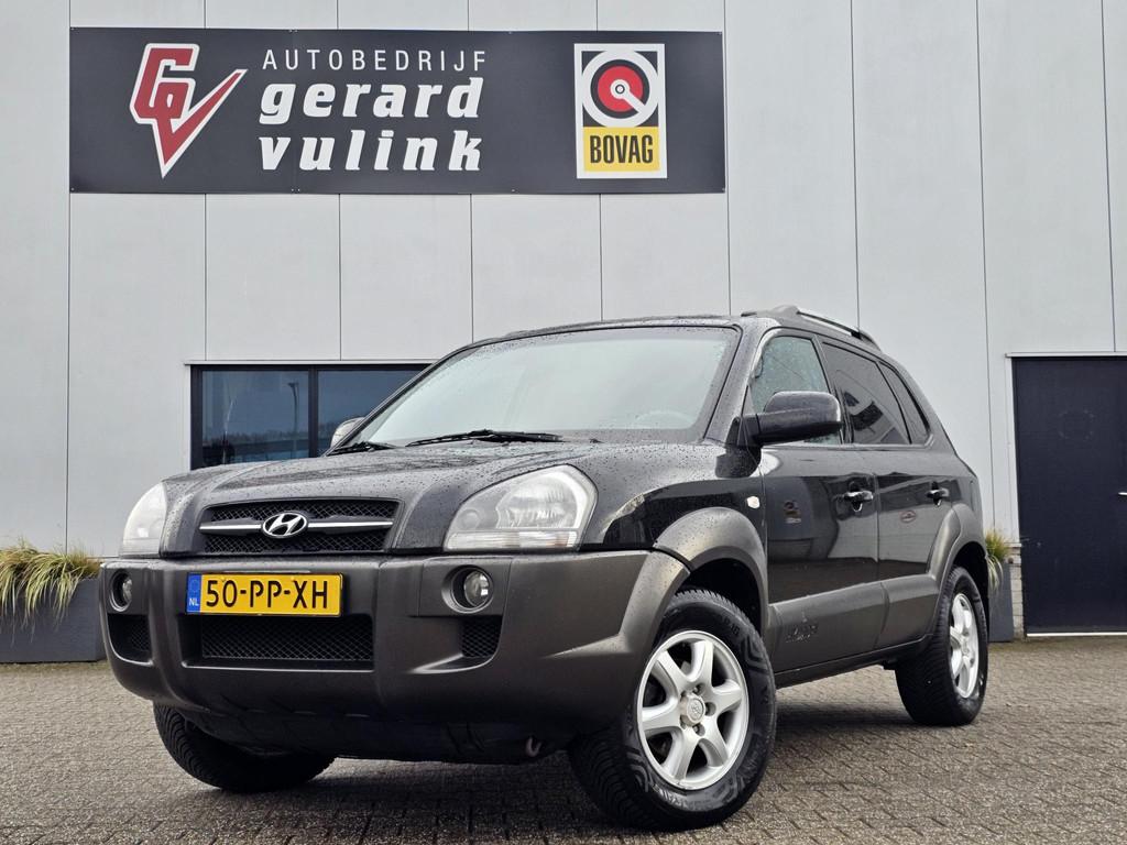 Hyundai Tucson 2.0i Dynamic CRUISE AIRCO TREKHAAK, Auto's, Stof, Gebruikt, 4 cilinders, Zwart