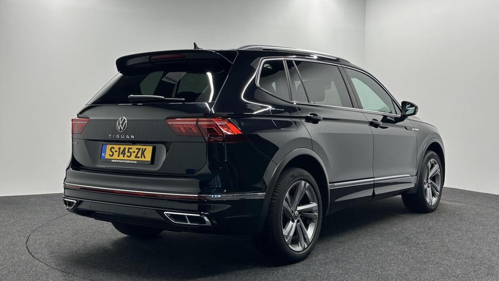 Volkswagen Tiguan Allspace 1.5 TSI R-Line Business 7p. LEER, Auto's, Volkswagen, 4 cilinders, 1553 kg, 7 stoelen, Zwart