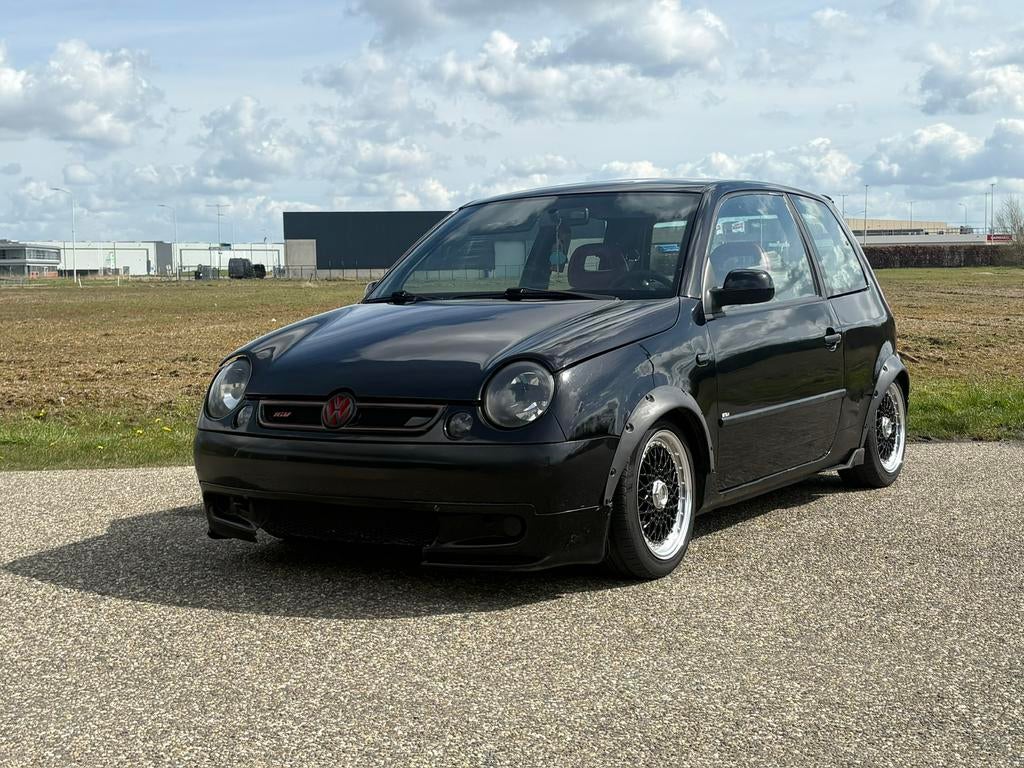 Volkswagen Lupo 1.4 55KW AUT 1999 Zwart, Auto's, Volkswagen, 450 kg, 924 kg, 31 €/maand, 4 cilinders