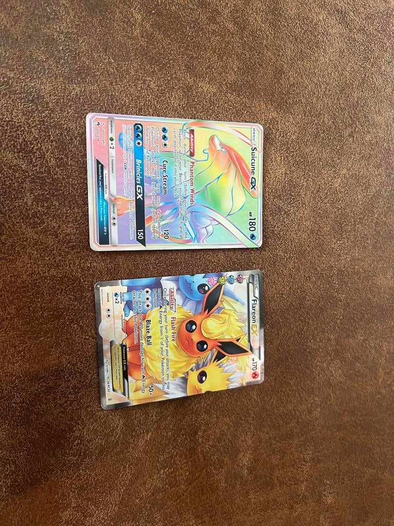 Pokémon kaarten (Suicune GX & Flareon EX) met lichte schade, Verzenden, Gebruikt, Meerdere kaarten, Foil