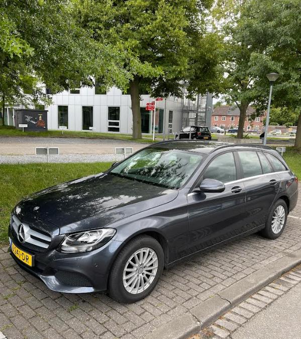 Mercedes-Benz C-Klasse C180 d 116pk 7G-TRONIC 2015 Grijs, Auto's, Achterwielaandrijving, 4 cilinders, Overige bekleding, 23 km/l