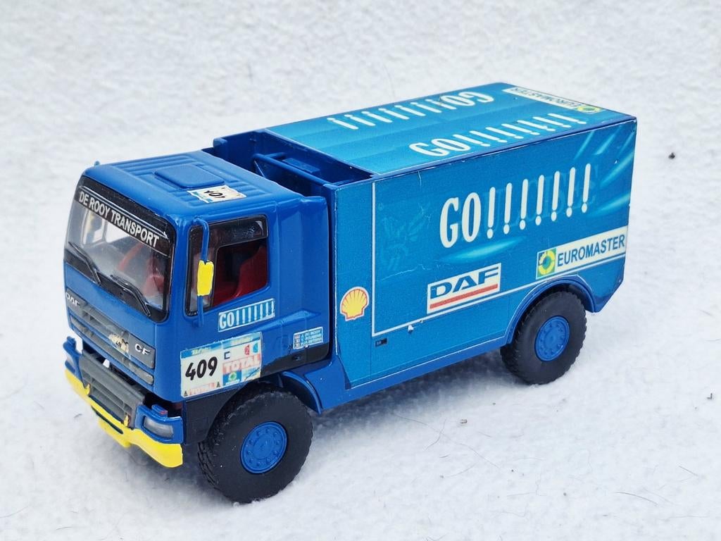 DAF De Rooy Transport Parijs - Dakar 2005 modelauto, Hobby en Vrije tijd, Modelauto's | 1:50, Bus of Vrachtwagen, Lion Toys, Ophalen of Verzenden