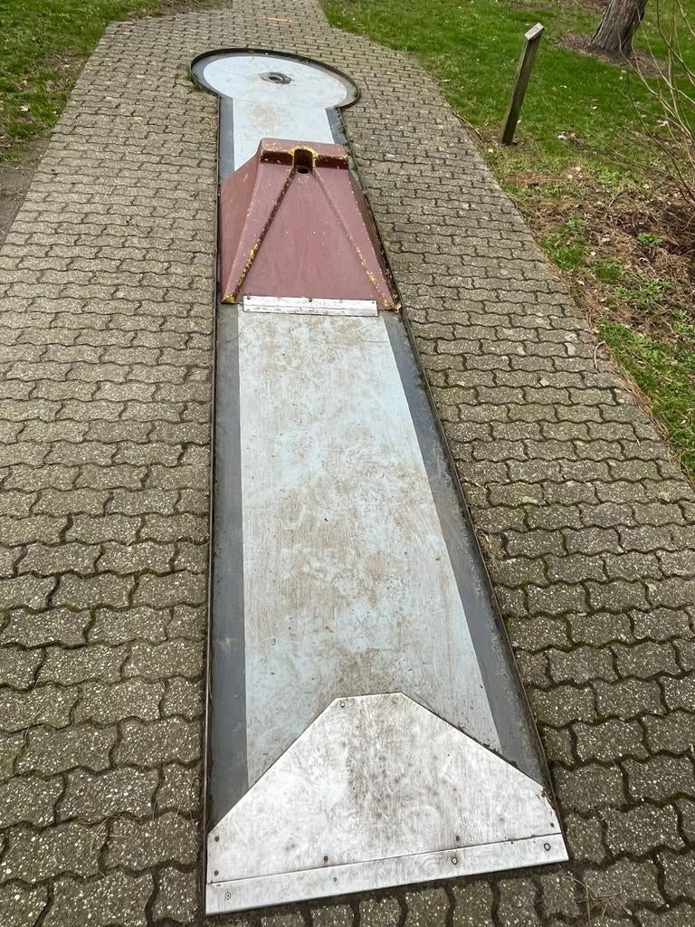 Midgetgolf baan, Ophalen