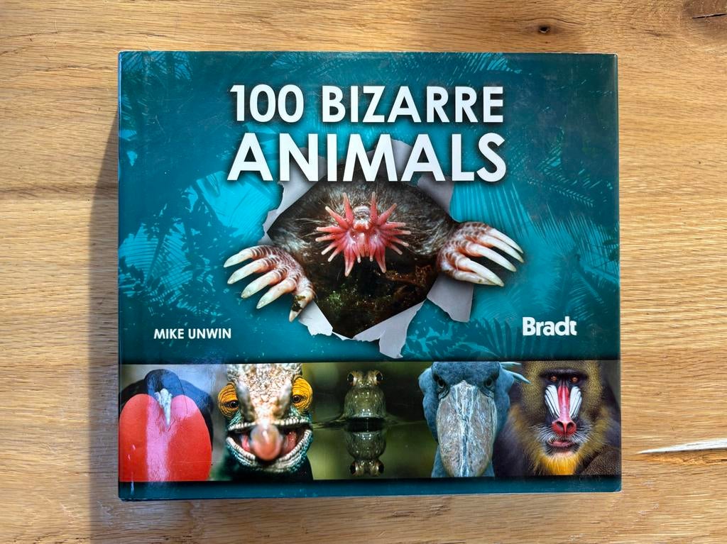 100 bizarre Animals - Mike Unwin, Dieren en Toebehoren, Ophalen of Verzenden, Zo goed als nieuw