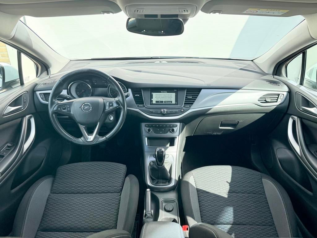 Opel Astra Sports Tourer 1.2 Business Executive|Trekhaak|CAM, Voorwielaandrijving, Stof, Gebruikt, 1199 cc