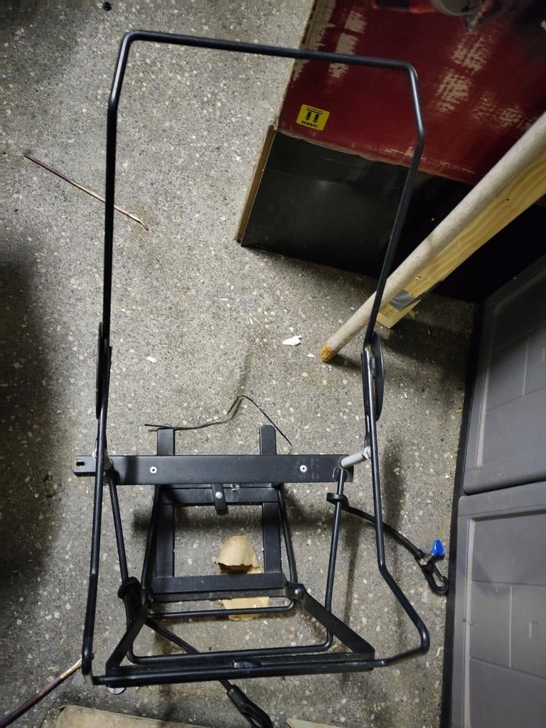 Maxicosi bevestiging voor bakfiets, Ophalen