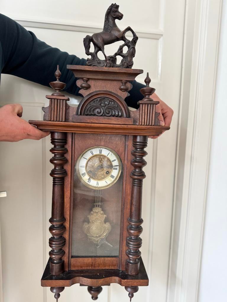 Oude (antieke) wandklok, Ophalen
