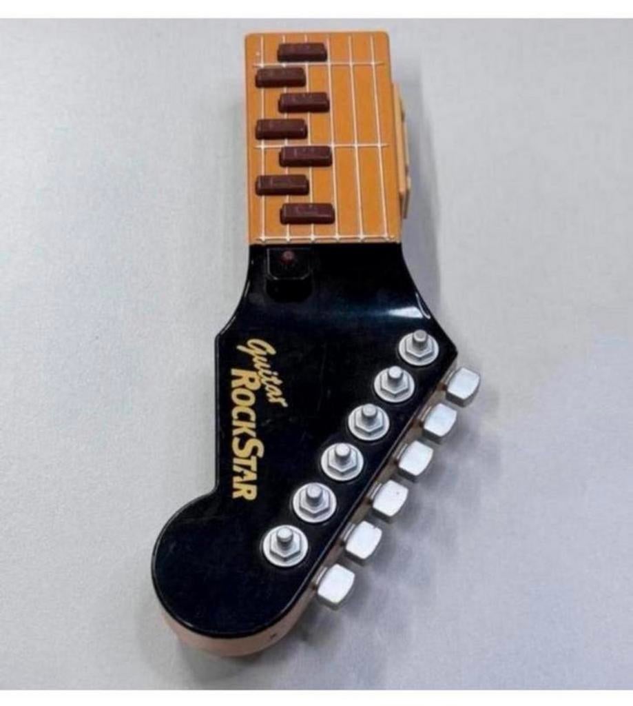 Tomy Guitar RockStar - Infra Red Beam Air Gitaar 8 liedjes, Kinderen en Baby's, Speelgoed | Overig, Jongen of Meisje, Ophalen of Verzenden