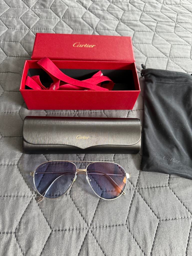 Cartier zonnebril, Sieraden, Tassen en Uiterlijk, Zonnebrillen en Brillen | Heren, Overige merken, Zonnebril, Blauw, Ophalen of Verzenden