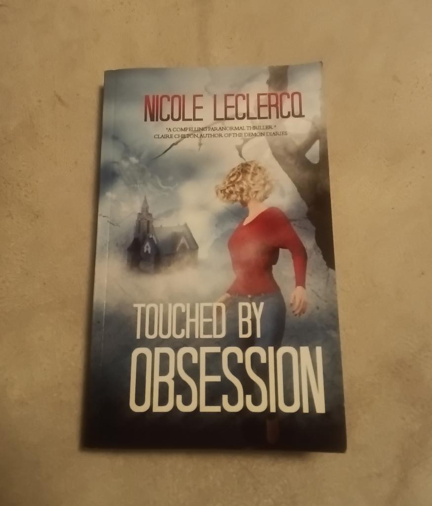 Touched by Obsession - Nicole Leclercq, Boeken, Overige Boeken, Gelezen, Ophalen of Verzenden
