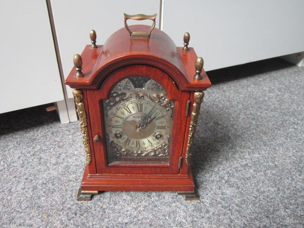 WARMINK TAFELKLOK, Ophalen