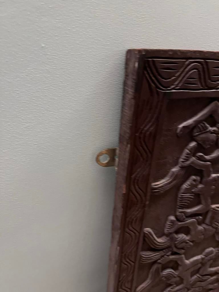 Houten paneel met Afrikaanse kunst, Ophalen