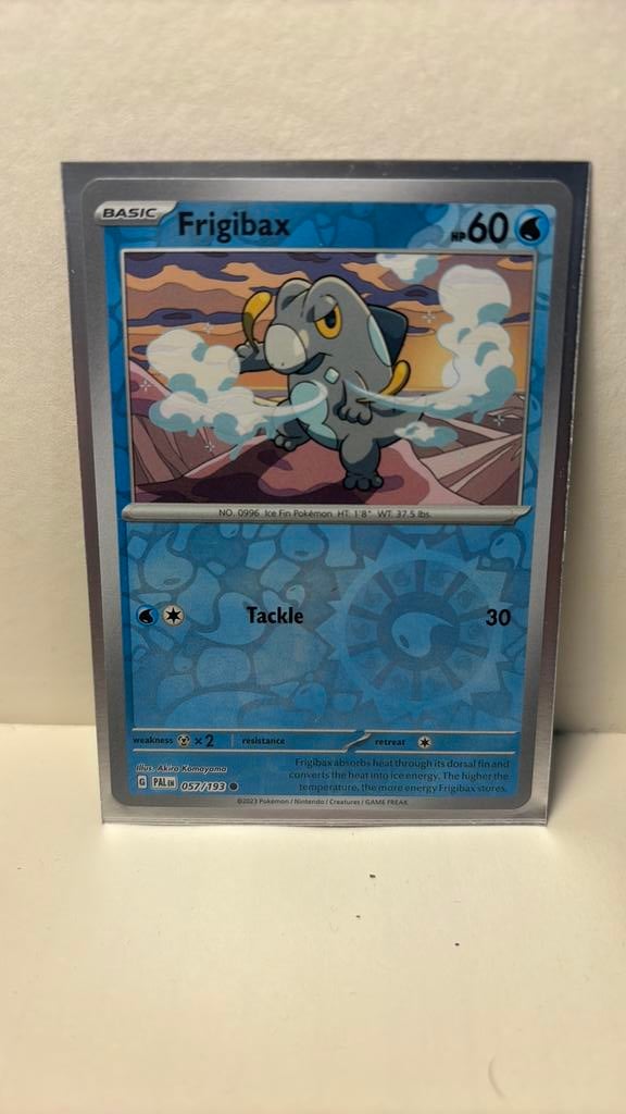 Frigibax 057/193 paldea evolved reverse holo pokemon kaart, Ophalen of Verzenden, Nieuw, Boosterbox