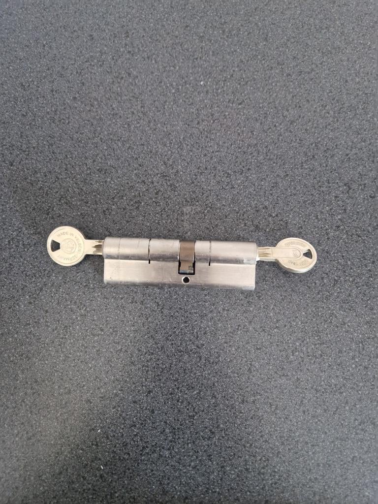 Cilinderslot 45/55 2 sterren skg 2 sleutels, Ophalen of Verzenden, Zo goed als nieuw, Rvs, Slot