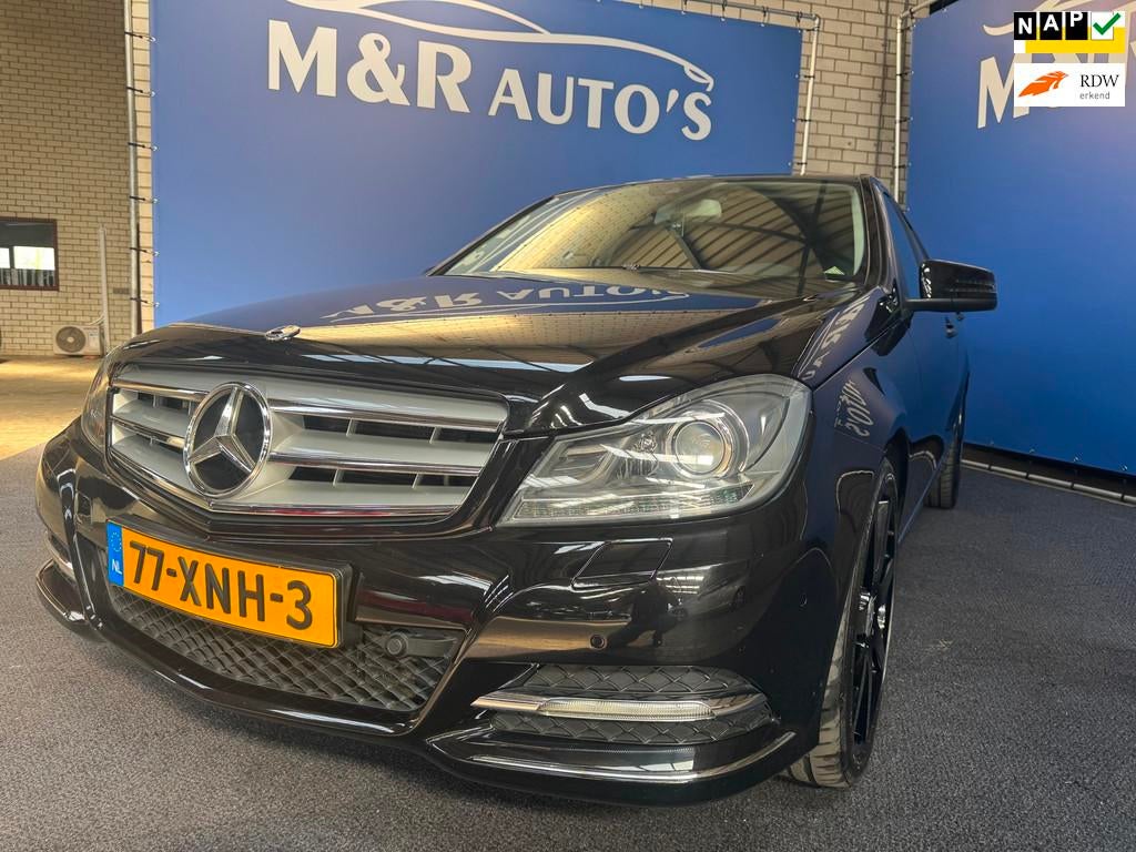 Mercedes-Benz C-klasse 180 Business Class Avantgarde Automaa, Auto's, Achterwielaandrijving, Leder en Stof, Zwart, Sedan