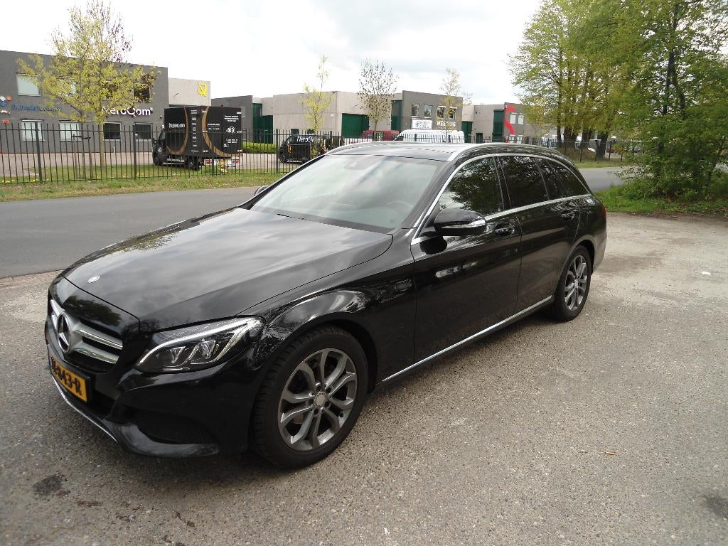 Mercedes-Benz C-Klasse 1.6 C180 Estate 2015 Zwart, Auto's, Mercedes-Benz, Automaat, Achterwielaandrijving, 1800 kg, Leder en Stof