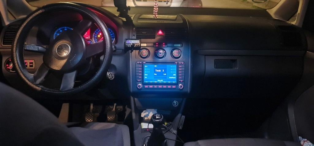 Volkswagen Touran 1.6 85KW 2006 Grijs, Auto's, 4 cilinders, Origineel Nederlands, 75 €/maand, Handgeschakeld