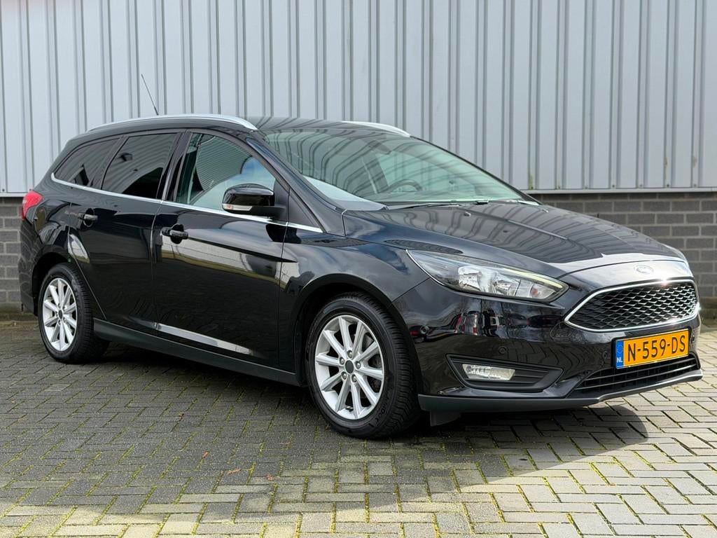 Ford Focus Wagon 1.0 Titanium |Navi|CruiseCtrl|PDC|Stuur/Sto, Auto's, Gebruikt, Zwart, Handgeschakeld, 1216 kg