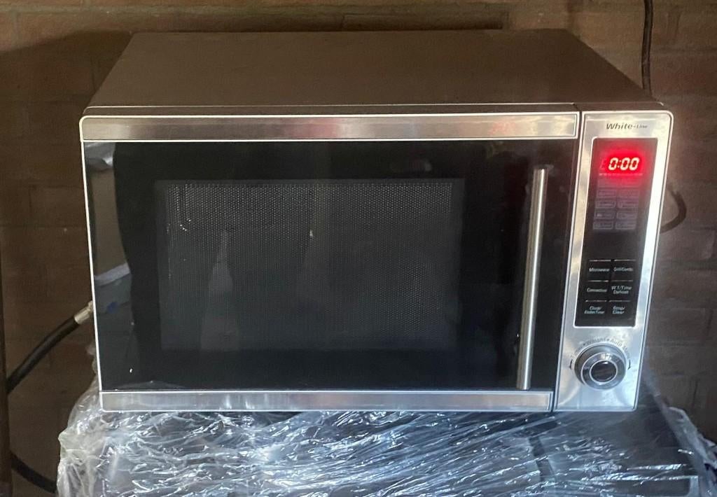 RVS combimagnetron met grill en hete lucht (ovenfunctie), Witgoed en Apparatuur, Magnetrons, Ophalen, Combimagnetron, Gebruikt