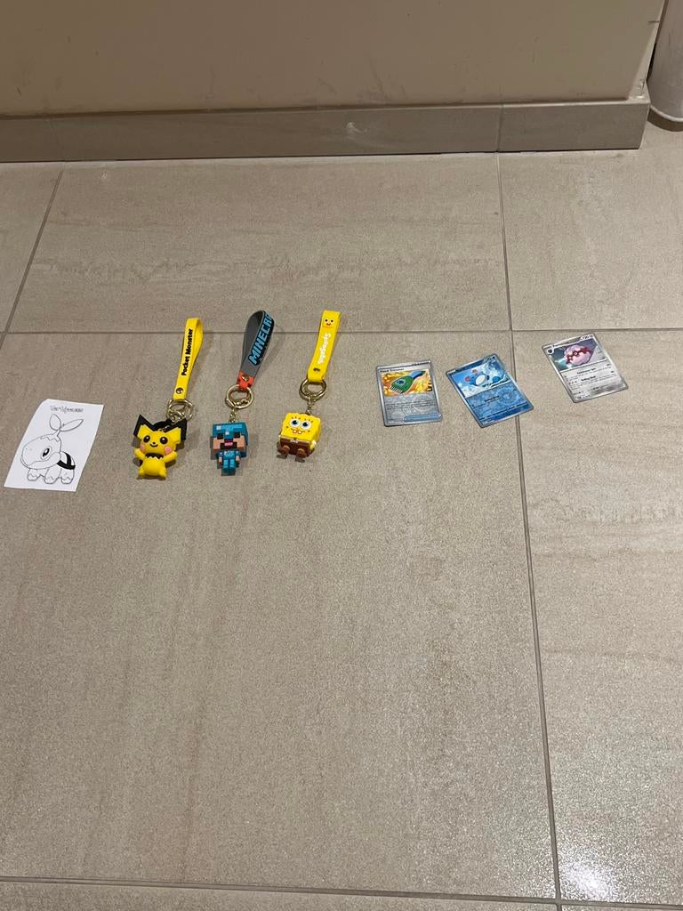 Pokémon kaarten, sleutelhanger & kleurplaat, Ophalen of Verzenden, Gebruikt, Losse kaart