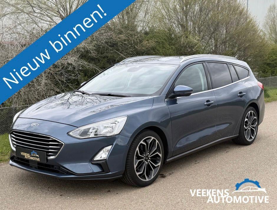 Ford Focus 1.0 Ecoboost Titanium 125pk Automaat *Trekhaak*, Auto's, Euro 6, 715 kg, Blauw, USB