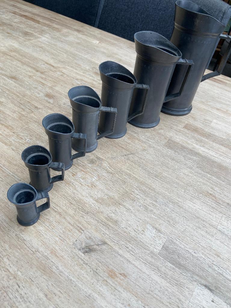 7 tinnen kannetjes, Verzenden