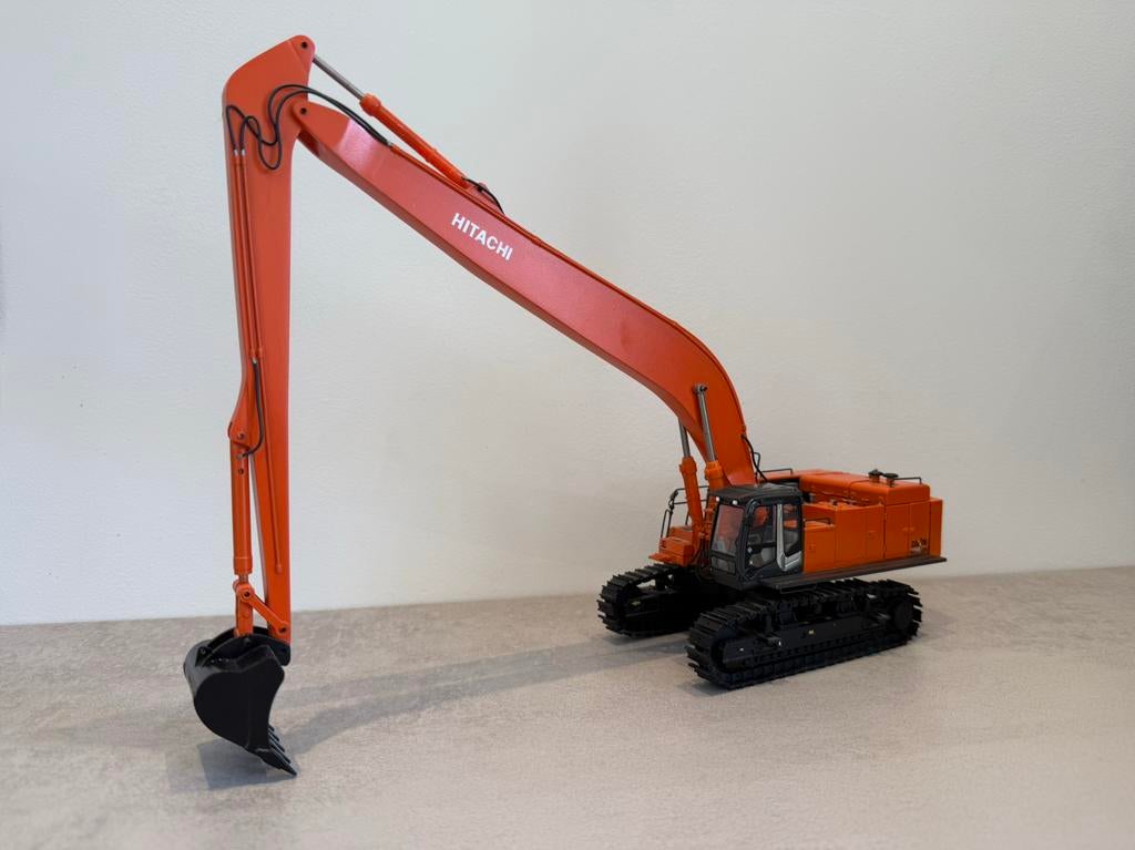 Hitachi 870 long reach wsi, Ophalen of Verzenden, Zo goed als nieuw, Bus of Vrachtwagen, Wsi