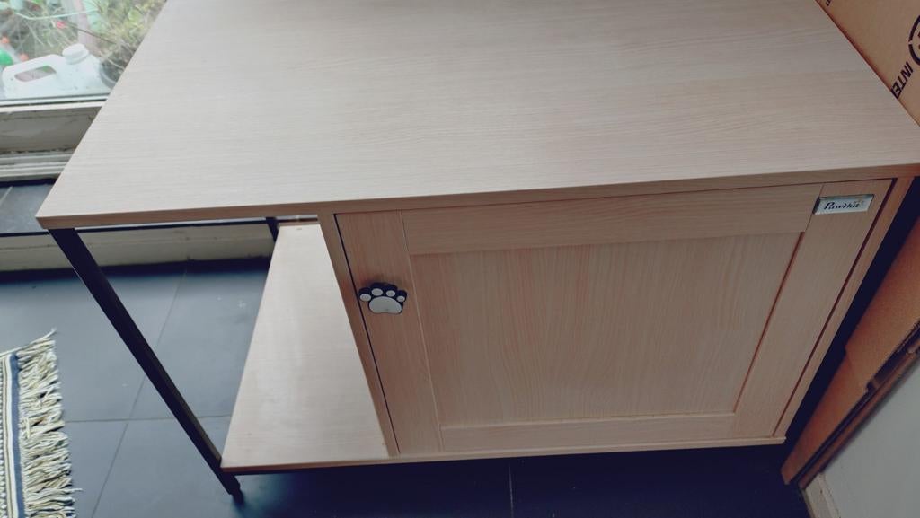 Kattenbak kast, Ophalen