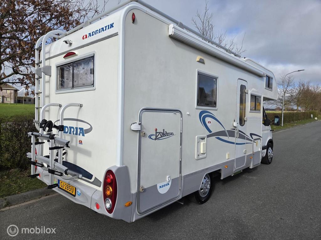 Adria mobil Izola A697 SG Gezinscamper ☆136pk, Airco☆, Caravans en Kamperen, Campers, Alkoof, Koelkast, Luifel, Bedrijf