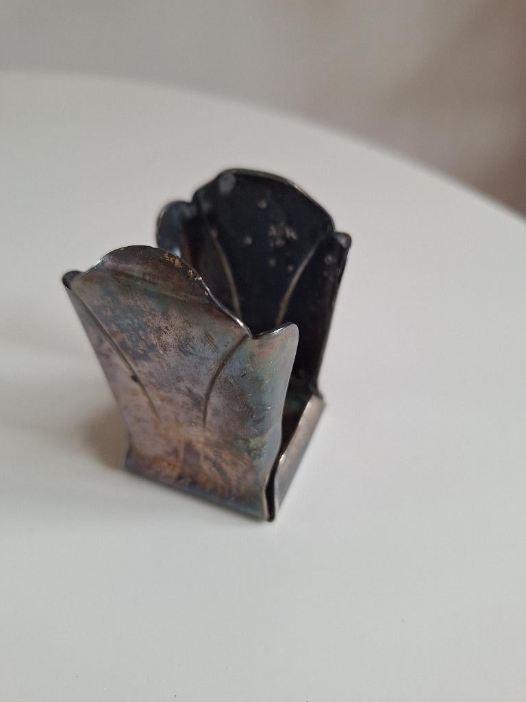 Verzilverde Maggi Houder, Ophalen