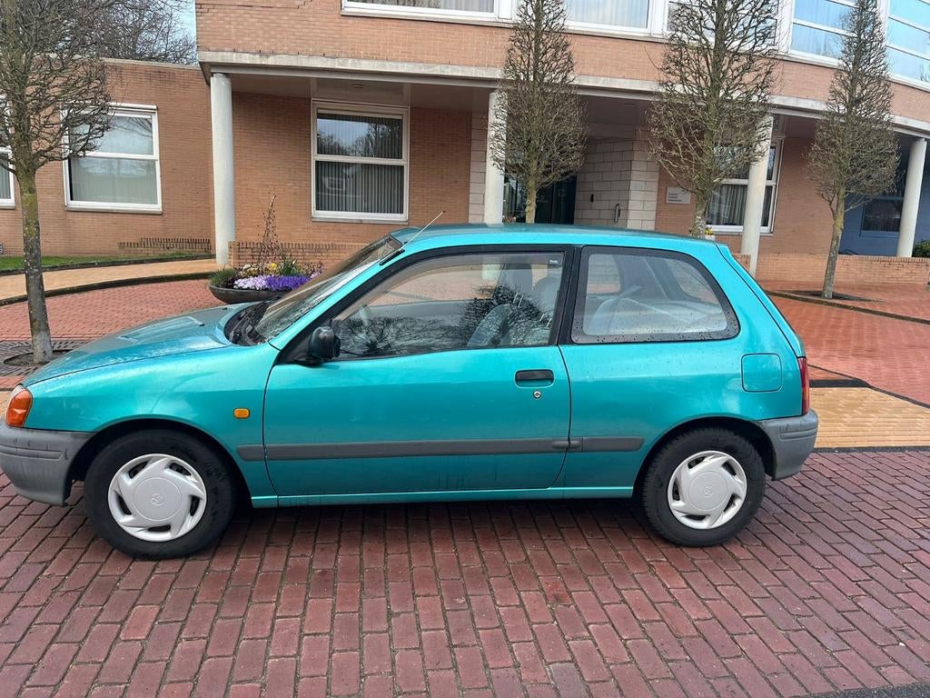 Toyota Starlet 1.3 16V AUT 1996 Groen, Auto's, Toyota, Automaat, 4 cilinders, Starlet, 400 kg