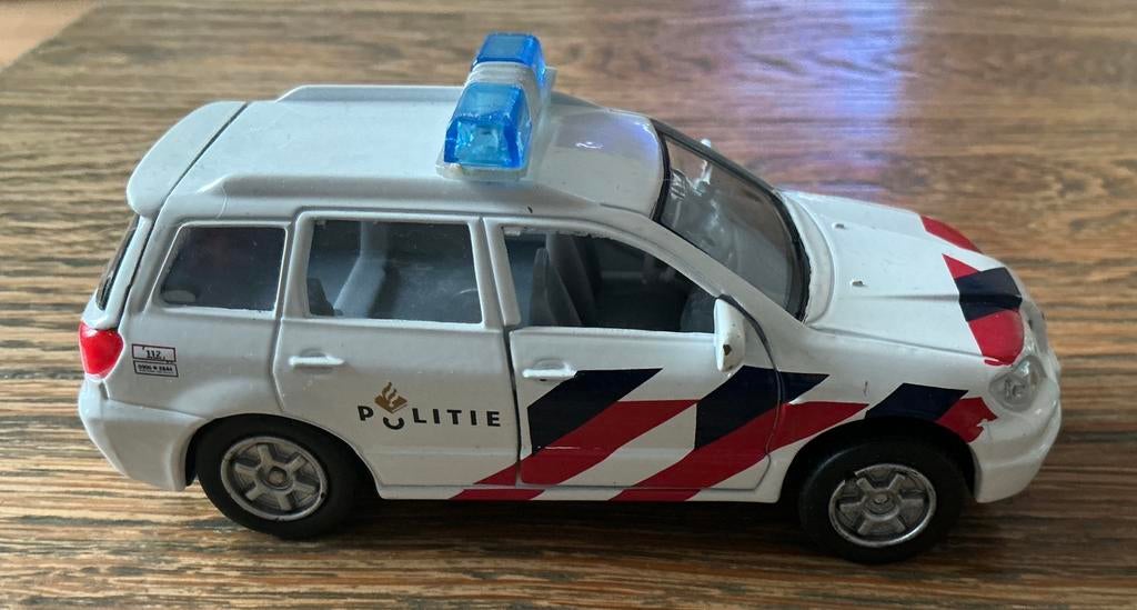Politie Auto Mitsubishi auto achterklep kan ook open, Ophalen, Zo goed als nieuw, Auto