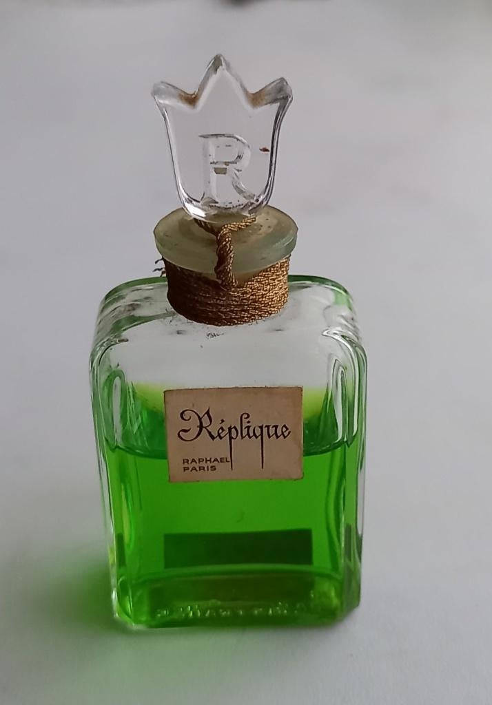 Vintage parfumflesje Replique,  Raphael Paris, Ophalen of Verzenden, Gebruikt, Parfumfles, Gevuld