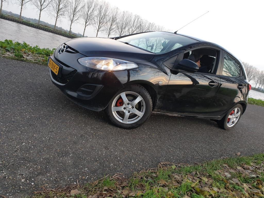 Mazda 2 1.3 Bifuel 75pk 5D 2013 Zwart, Auto's, Mazda, Particulier, Airbags, Airconditioning, Android Auto, Apple Carplay, Bluetooth